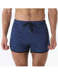 короткі темно-сині чоловічі спортивні шорти з кишенями на блискавці